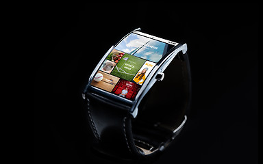 Image showing close up of smart watch with internet news