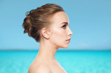 Image showing beautiful young woman face over white background