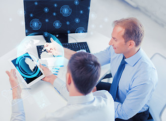 Image showing businessmen with tablet pc and computer at office