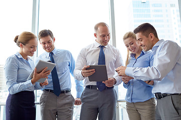 Image showing business people with tablet pc and smartphones