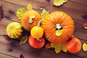 Image showing close up of pumpkins on wooden table at home