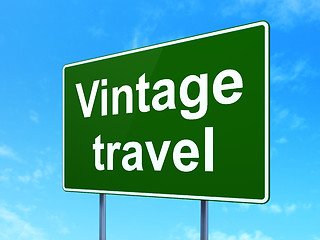 Image showing Tourism concept: Vintage Travel on road sign background