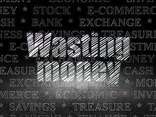 Image showing Currency concept: Wasting Money in grunge dark room