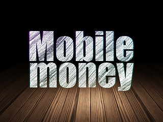 Image showing Money concept: Mobile Money in grunge dark room