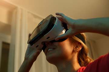 Image showing Woman looking though vr