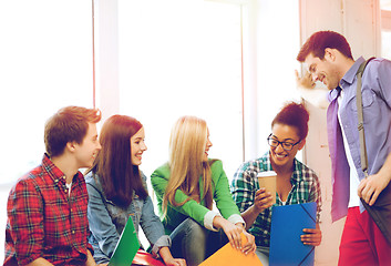 Image showing students communicating and laughing at school