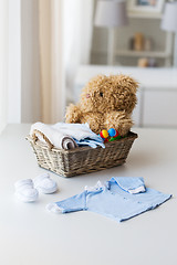 Image showing close up of baby clothes and toys for newborn