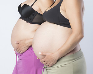 Image showing Pregnant Women holding her hands on beautiful belly