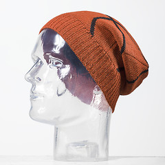 Image showing orange woolen handmade cap basketball ball alike