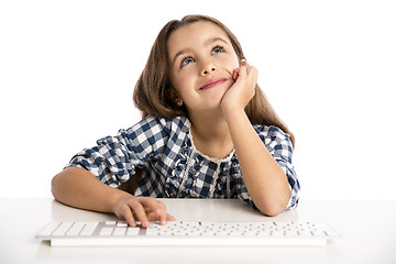 Image showing Little girl working with a computer