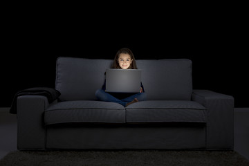 Image showing Little girl working with a laptop