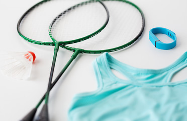 Image showing close up of badminton rackets with shuttlecock