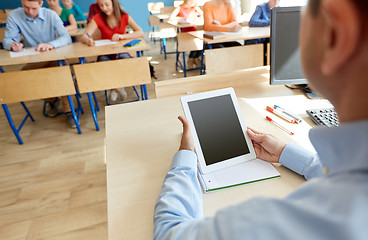 Image showing students and teacher with tablet pc at school
