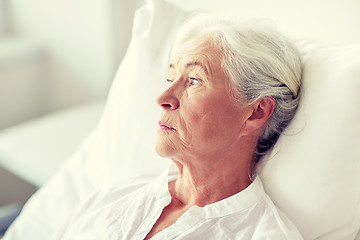 Image showing senior woman patient lying in bed at hospital ward