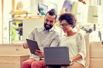 Image showing creative team with laptop and tablet pc in office