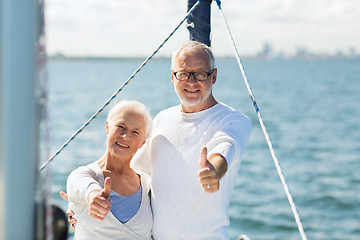 Image showing senior couple sailing on sea boat or yacht