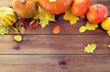 Image showing close up of pumpkins on wooden table at home