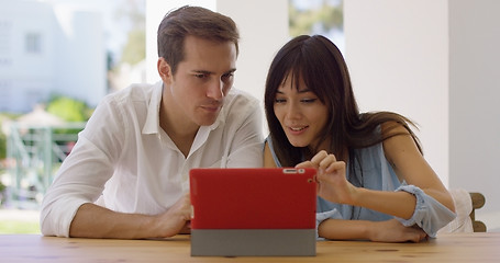 Image showing Man and woman using a tablet computer together