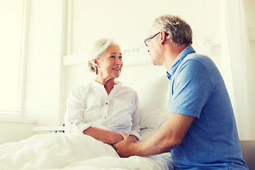 Image showing senior couple meeting at hospital ward