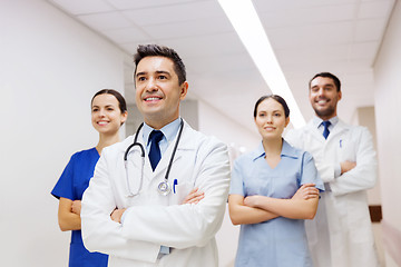 Image showing group of happy medics or doctors at hospital