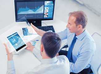 Image showing businessmen with tablet pc and computer at office