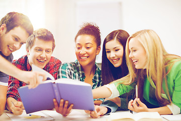 Image showing students reading book at school