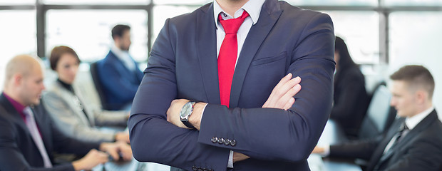 Image showing Team leader with coworkers working in office.