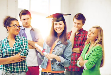 Image showing girl in graduation cap with certificate