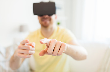 Image showing young man in virtual reality headset or 3d glasses