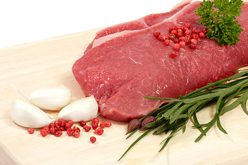 Image showing Steaks on a kitchen board