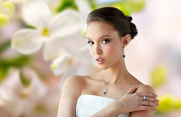 Image showing beautiful woman with earring, ring and pendant