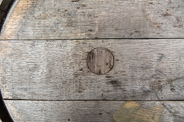 Image showing close up of old wooden barrel outdoors