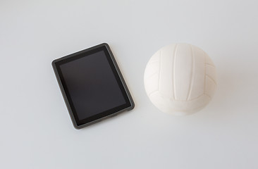 Image showing close up of volleyball ball and tablet pc computer