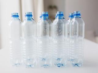 Image showing close up of empty used plastic bottles on table