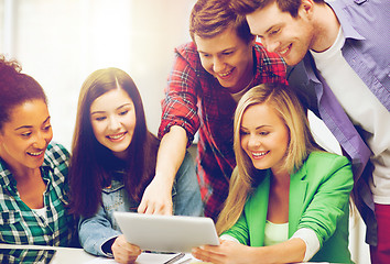 Image showing students looking at tablet pc in lecture at school