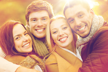 Image showing group of friends having fun in autumn park