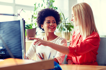 Image showing happy women or students with computer in office