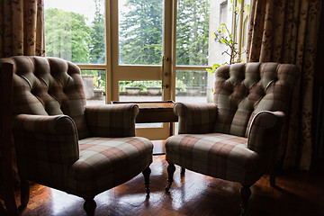 Image showing close up of vintage armchairs and table in hotel