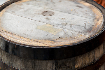 Image showing close up of old wooden barrel outdoors