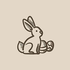 Image showing Easter bunny with eggs sketch icon.