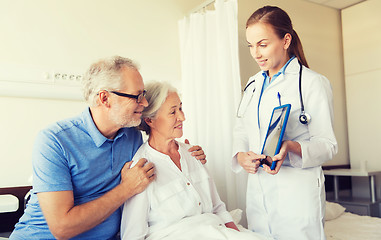 Image showing senior woman and doctor with tablet pc at hospital