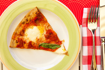 Image showing margarita pizza with basil on a plate