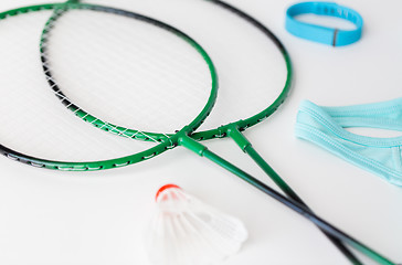 Image showing close up of badminton rackets with shuttlecock