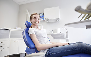 Image showing happy patient girl at dental clinic office