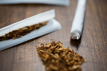 Image showing close up of marijuana joint and tobacco