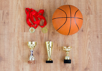 Image showing basketball ball with cups and golden medals