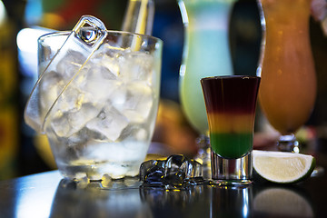 Image showing cocktails on bar background