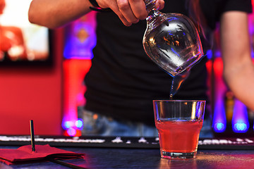 Image showing Barmen making cocktail