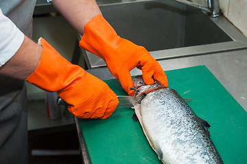 Image showing cutting salmon fish