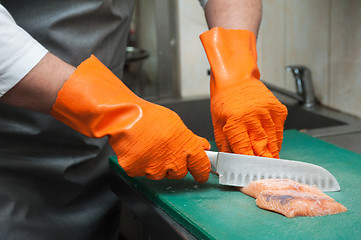 Image showing cutting salmon fish